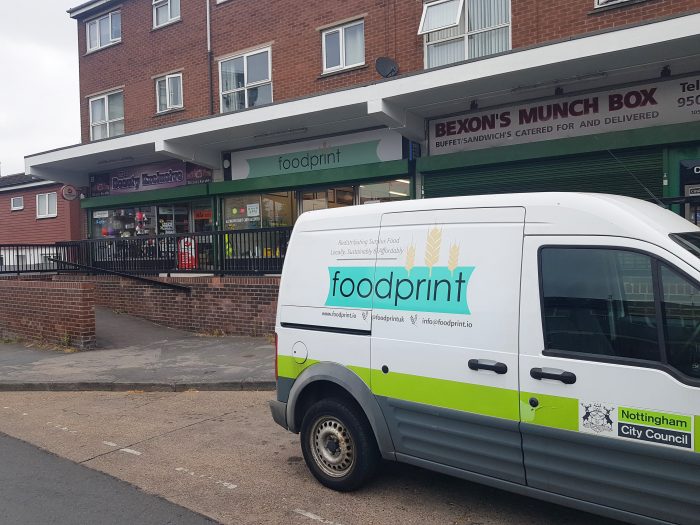 Foodprint van parked up outside row of shops